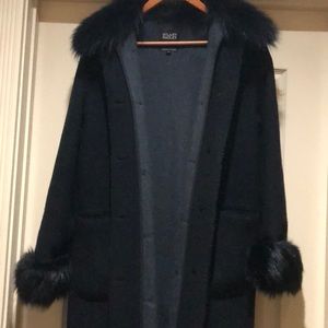 In GUC full length black wool coat. Real fur trim